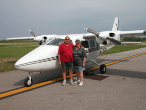 Us with the Fresh Air Aviation plane in Michigan